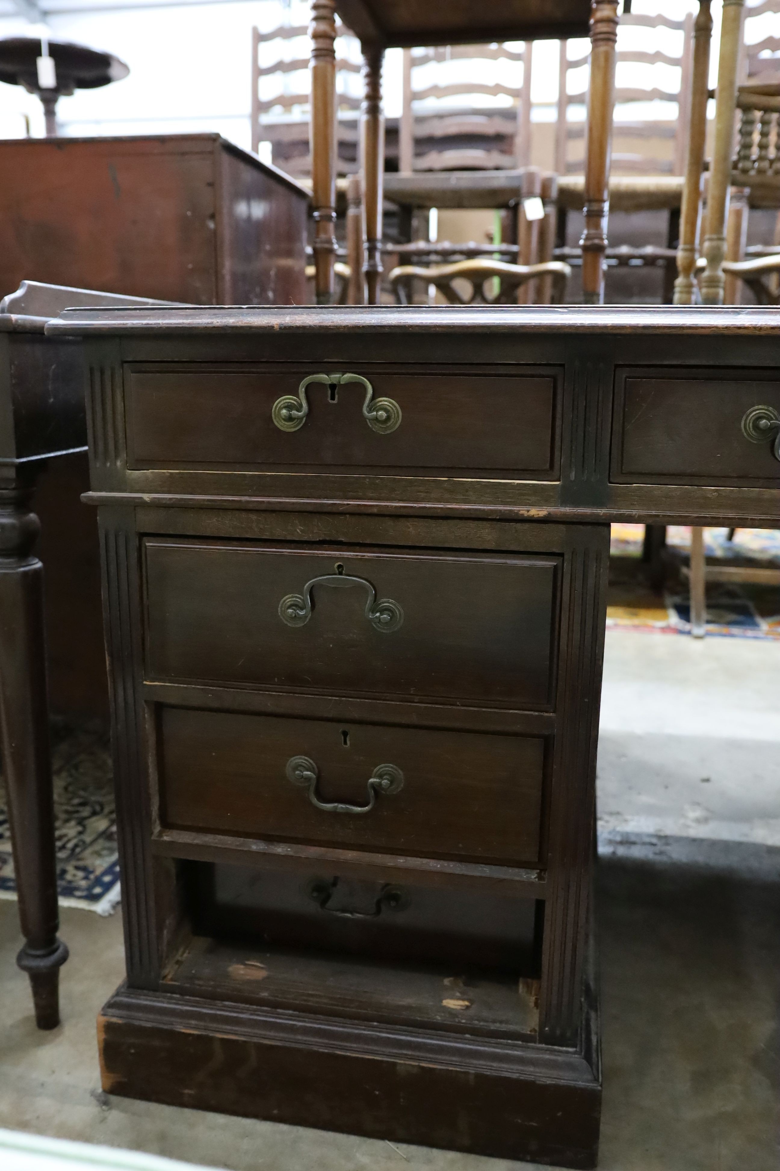 An early 20th century mahogany pedestal partner's desk, length 152cm, depth 112cm, height 77cm